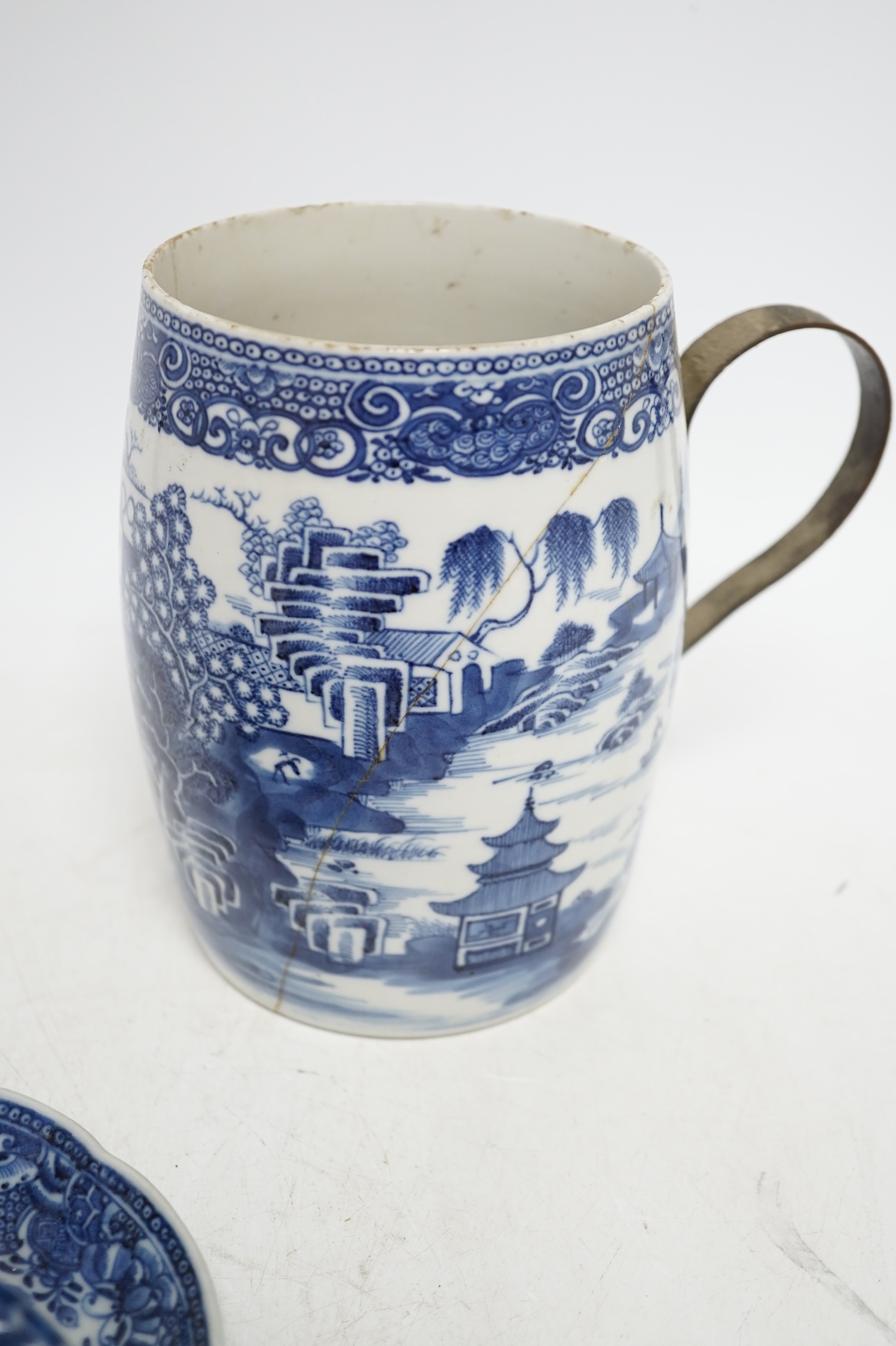 A group of five 18th century Chinese export ceramics to include a rare blue and white ‘dragon’ chamberstick, tallest 16cm. Condition - poor